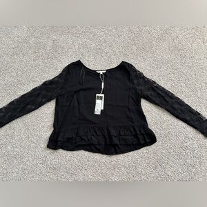 Chic Black Ruffle Hem Blouse